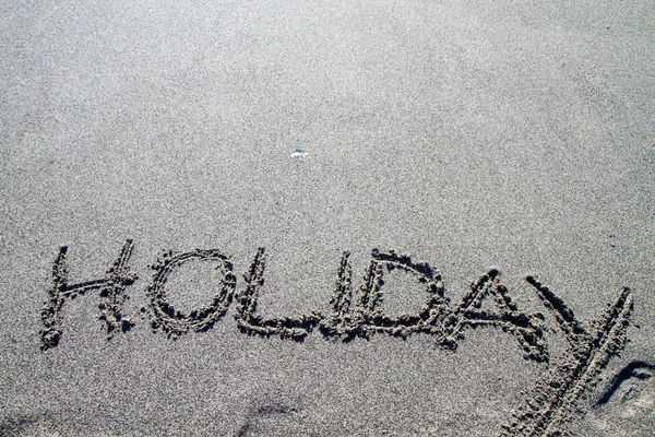 Λέξεις γραμμένες στην παραλία με βότσαλα, διακοπές — Φωτογραφία Αρχείου