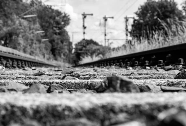 Detail of ballast in a track bed in black and white