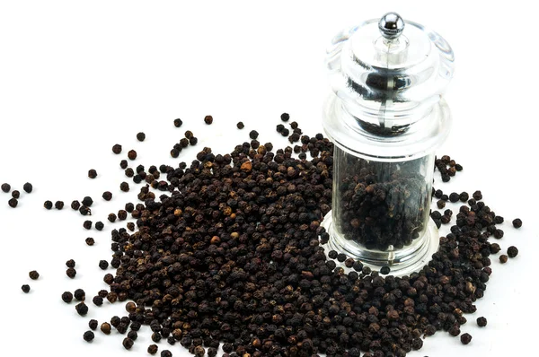 Glass pepper Grinder of fresh black peppercorn — Stock Photo, Image