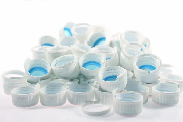 White plastic caps Stock Image