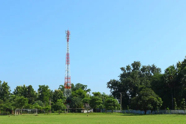 Telephone tower in the garden and play ground