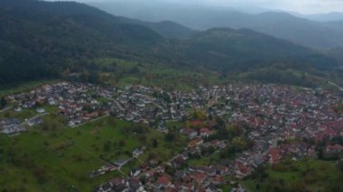 Aerial view of the city  Loffenau in Germany  on a cloudy day in autumn, fall. 