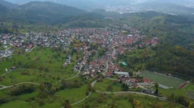 Aerial view of the city  Loffenau in Germany  on a cloudy day in autumn, fall. 