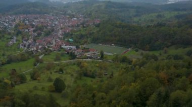 Aerial view of the city  Loffenau in Germany  on a cloudy day in autumn, fall. 