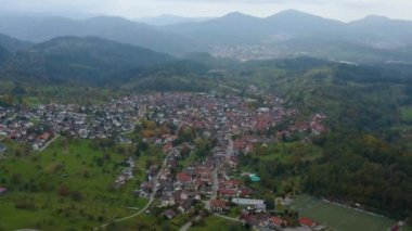Aerial view of the city  Loffenau in Germany  on a cloudy day in autumn, fall. 