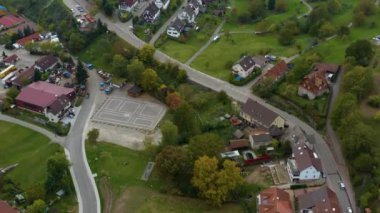 Aerial view of the city  Loffenau in Germany  on a cloudy day in autumn, fall. 