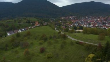 Aerial view of the city  Loffenau in Germany  on a cloudy day in autumn, fall. 