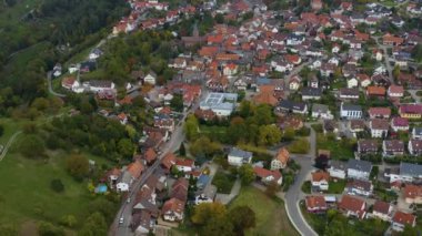 Aerial view of the city  Loffenau in Germany  on a cloudy day in autumn, fall. 