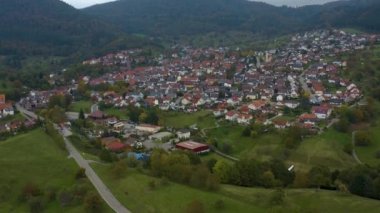 Aerial view of the city  Loffenau in Germany  on a cloudy day in autumn, fall. 