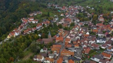 Aerial view of the city  Loffenau in Germany  on a cloudy day in autumn, fall. 