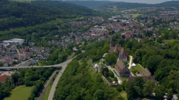 Aerial of the monastery Kloster Lorch beside the city Lorch in Germany. On a sunny day in spring.