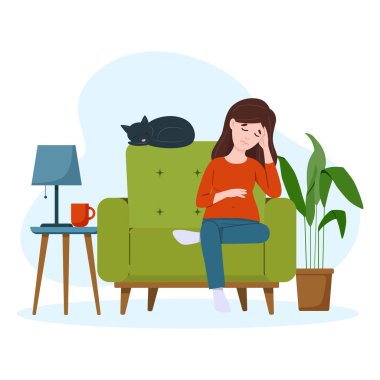 Yorgun hamile kadın kanepede oturuyor. Ağır hamilelik kavramı.