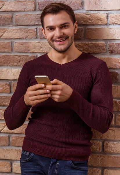 Attractive businessman with gadget — Stock Photo, Image