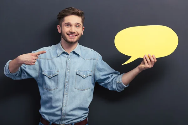 Estudiante guapo con burbuja del habla — Foto de Stock