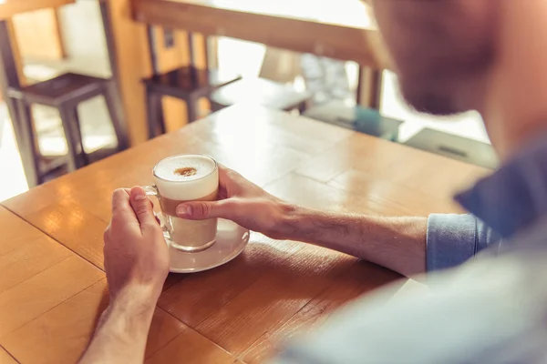 Young man in the cafe — Stock Photo, Image