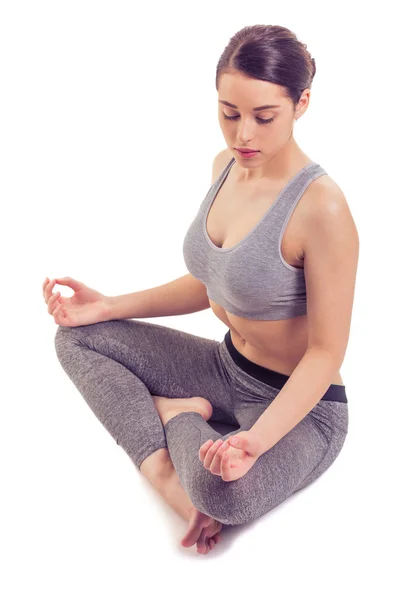 Chica atractiva haciendo yoga — Foto de Stock