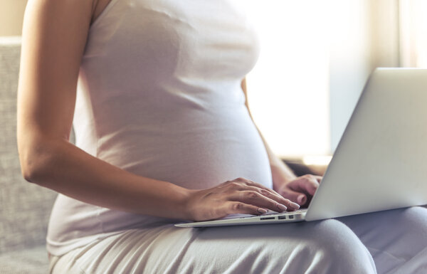 Beautiful pregnant woman at home