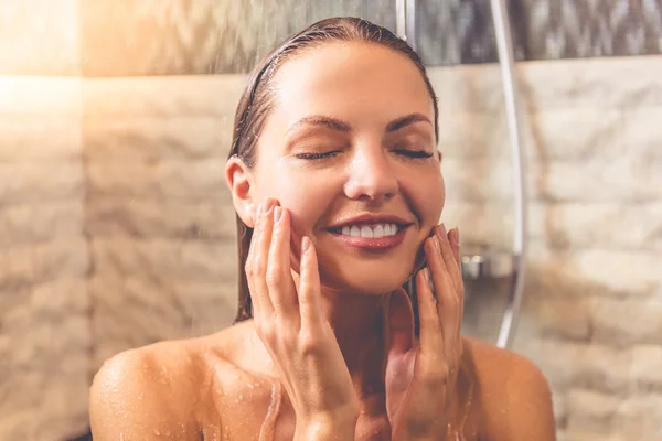 Beautiful woman taking shower — Stock Photo, Image