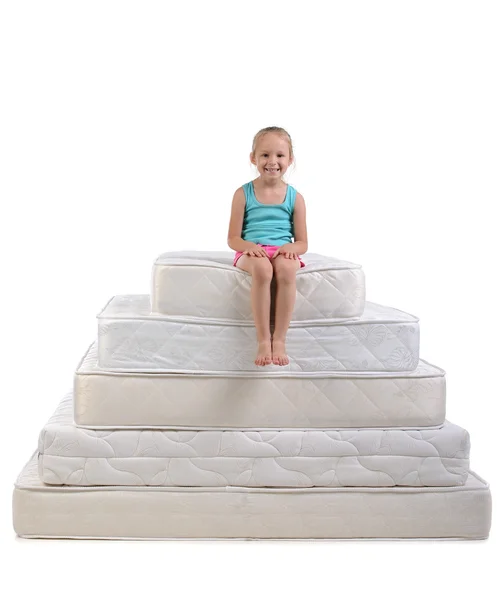 Children and many mattresses — Stock Photo, Image