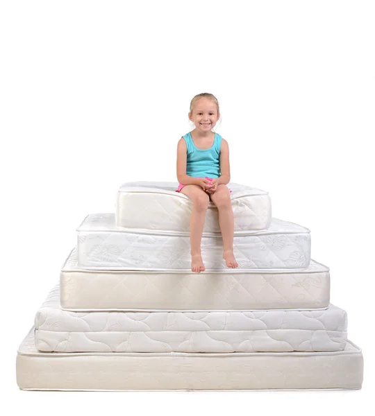 Children and many mattresses — Stock Photo, Image