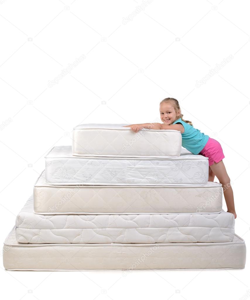 Children and many mattresses