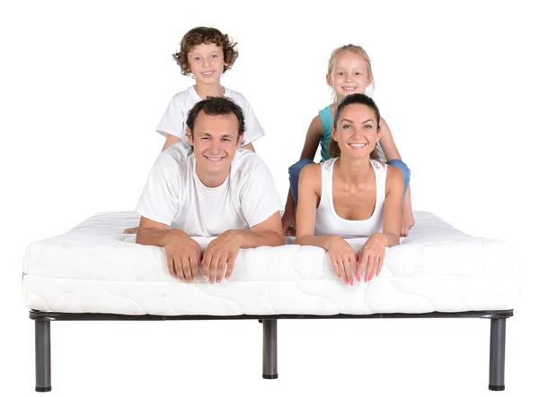 Famille sur le matelas — Photo