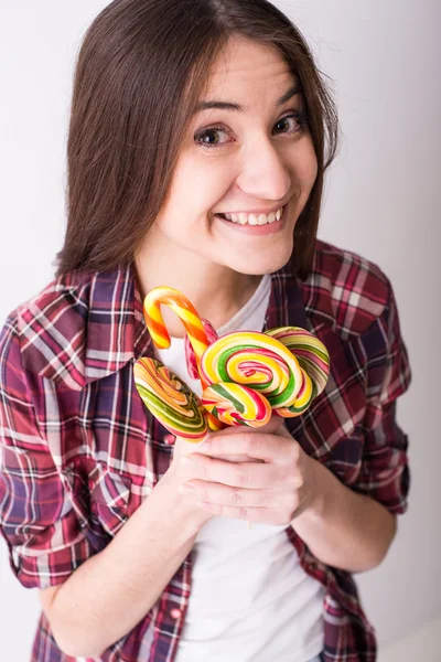 Woman with sweets. — Stock Photo, Image