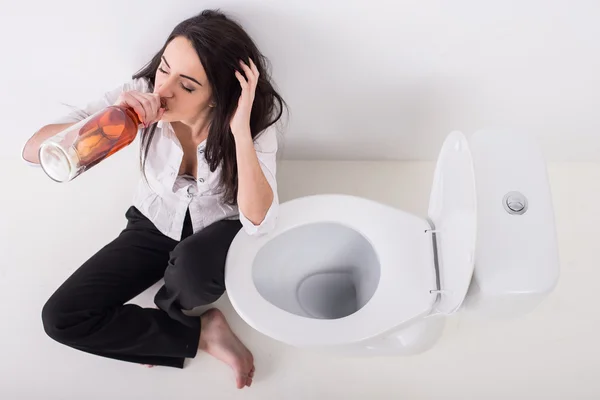 Woman in toilet — Stock Photo, Image