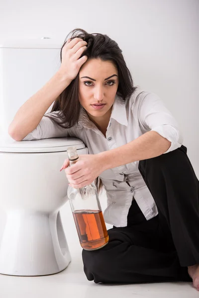 Woman in toilet — Stock Photo, Image
