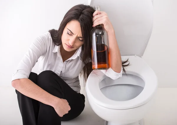 Woman in toilet — Stock Photo, Image