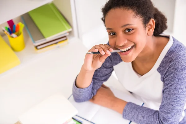 Schoolgirl at home — Stock Photo, Image