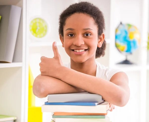 Schoolgirl at home — Stock Photo, Image