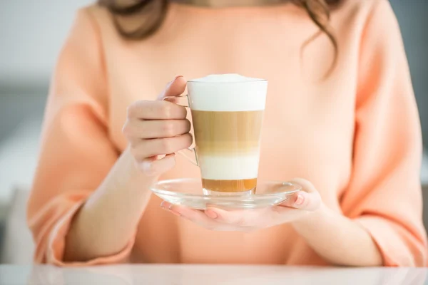 Girl with glass of coffee — Stock Photo, Image