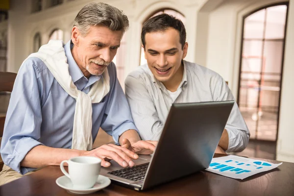 Businessmen in cafe — Stock Photo, Image