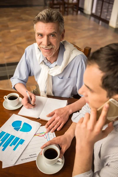 Businessmen in cafe — Stock Photo, Image