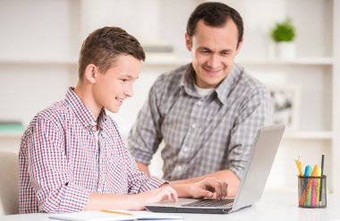 Father and son at home clipart