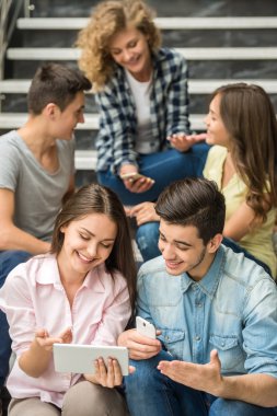 Students with gadgets