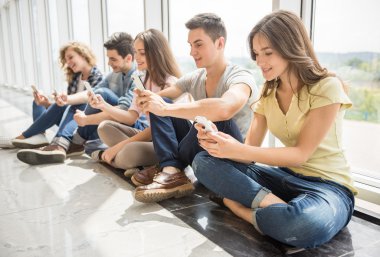 Students with gadgets