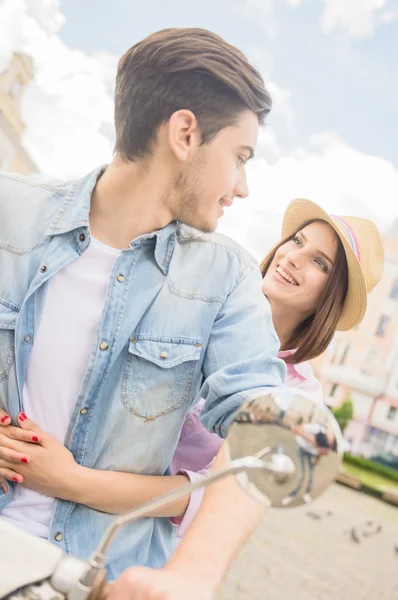 Young couple on scooter — Stock Photo, Image