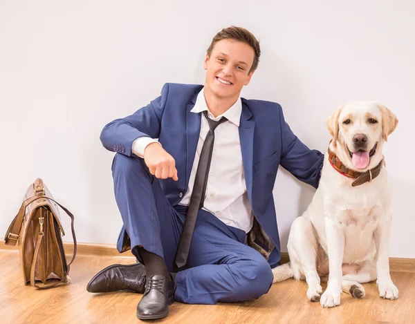 Podnikatel se psem — Stock fotografie