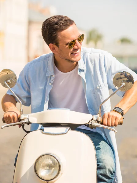 Riding on scooter — Stock Photo, Image