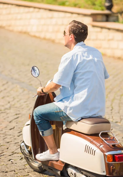 Riding on scooter — Stock Photo, Image