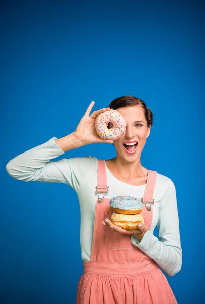 Woman with donuts. — Stock Photo, Image