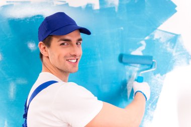 Male repairs indoors clipart