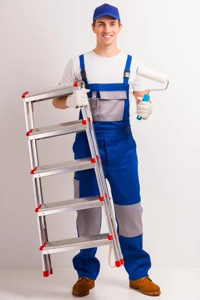 Male repairs indoors — Stock Image Male repairs indoors Stock Picture