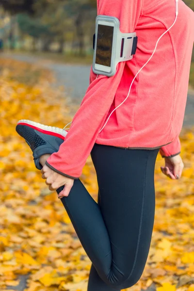 Running in the autumn park — Stock Photo, Image