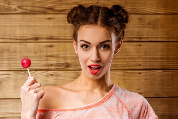 Portrait Beautiful Young Girl Long Curly Hair Lollipops Background Wooden — Stock Photo, Image