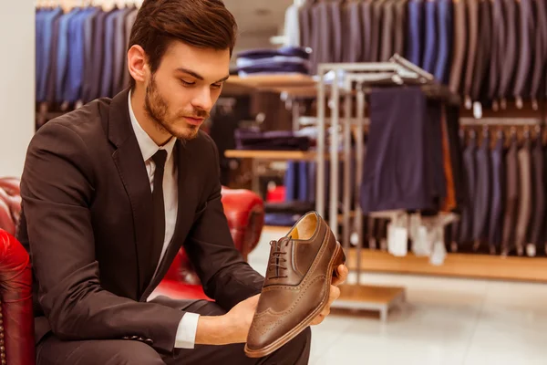 People in suit shop — Stock Photo, Image