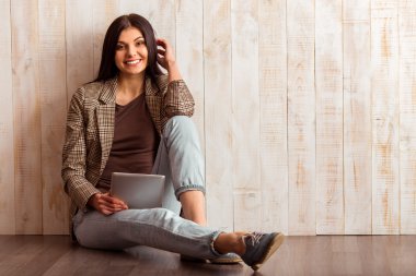 Stylish business girl and gadget 