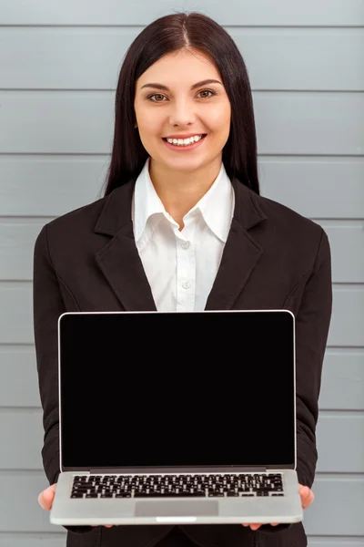 Business girl and gadget — Stockfoto